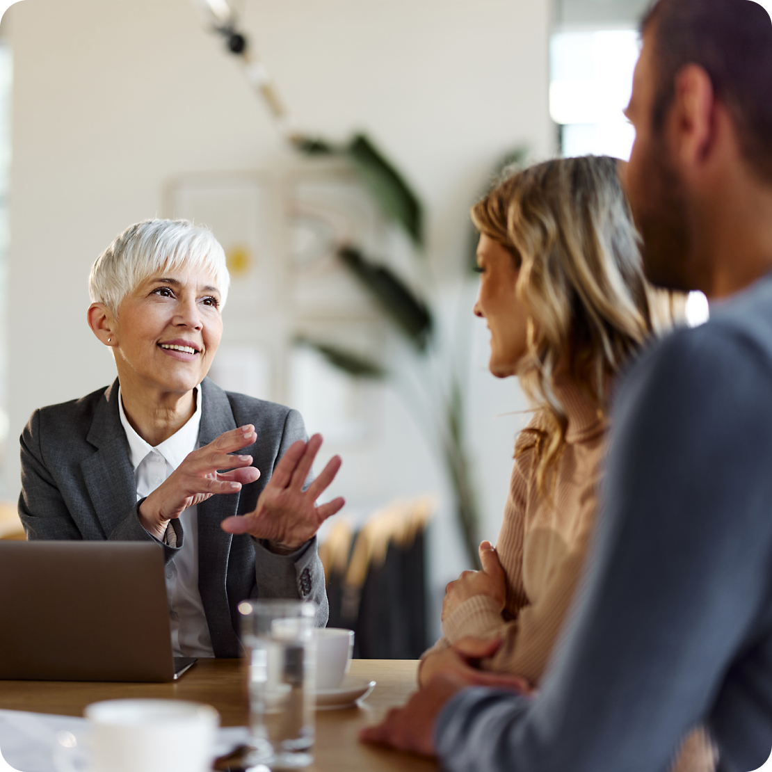 Image of 3 people collaborating in the office