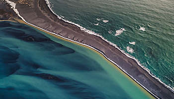aerial-view-of-thin-barrier-island-with-water-on-each-side