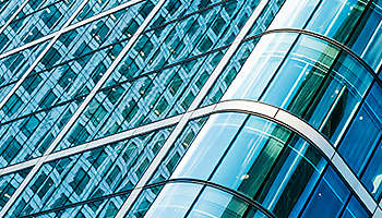 close-up-of-corner-of-glass-modern-building