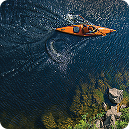 Kayaking on deep blue water