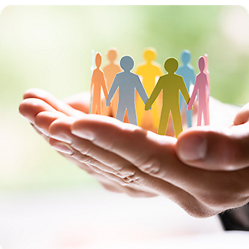 Hands Holding Paper Dolls