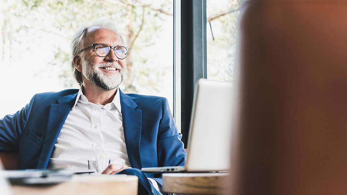 business man sitting at desk