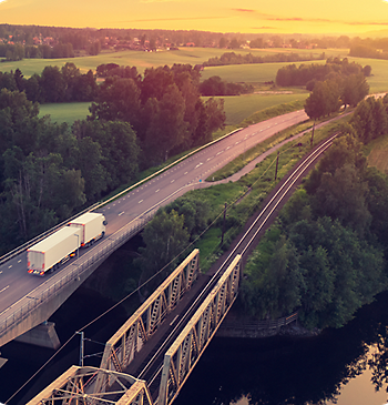 truck driving over bridge