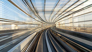 Motion blur of train moving inside tunnel in Tokyo, Japan Banner