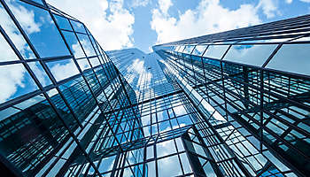 Clouds reflected in modern office buildings, Frankfurt, Germany
