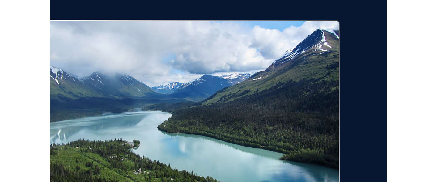 River and mountains on a cloudy day.